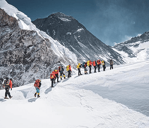 Trekker traversing untouched valleys beyond marked trails