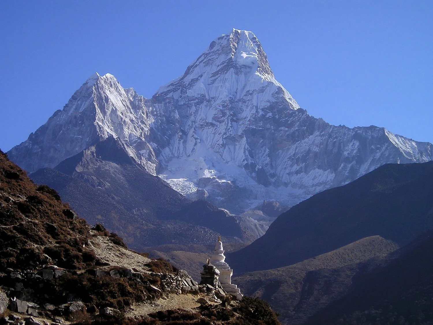 Ama Dablam peak (6,812m) seen from the Khumbu region, Nepal — the iconic pyramid-shaped mountain known as the Matterhorn of the Himalayas